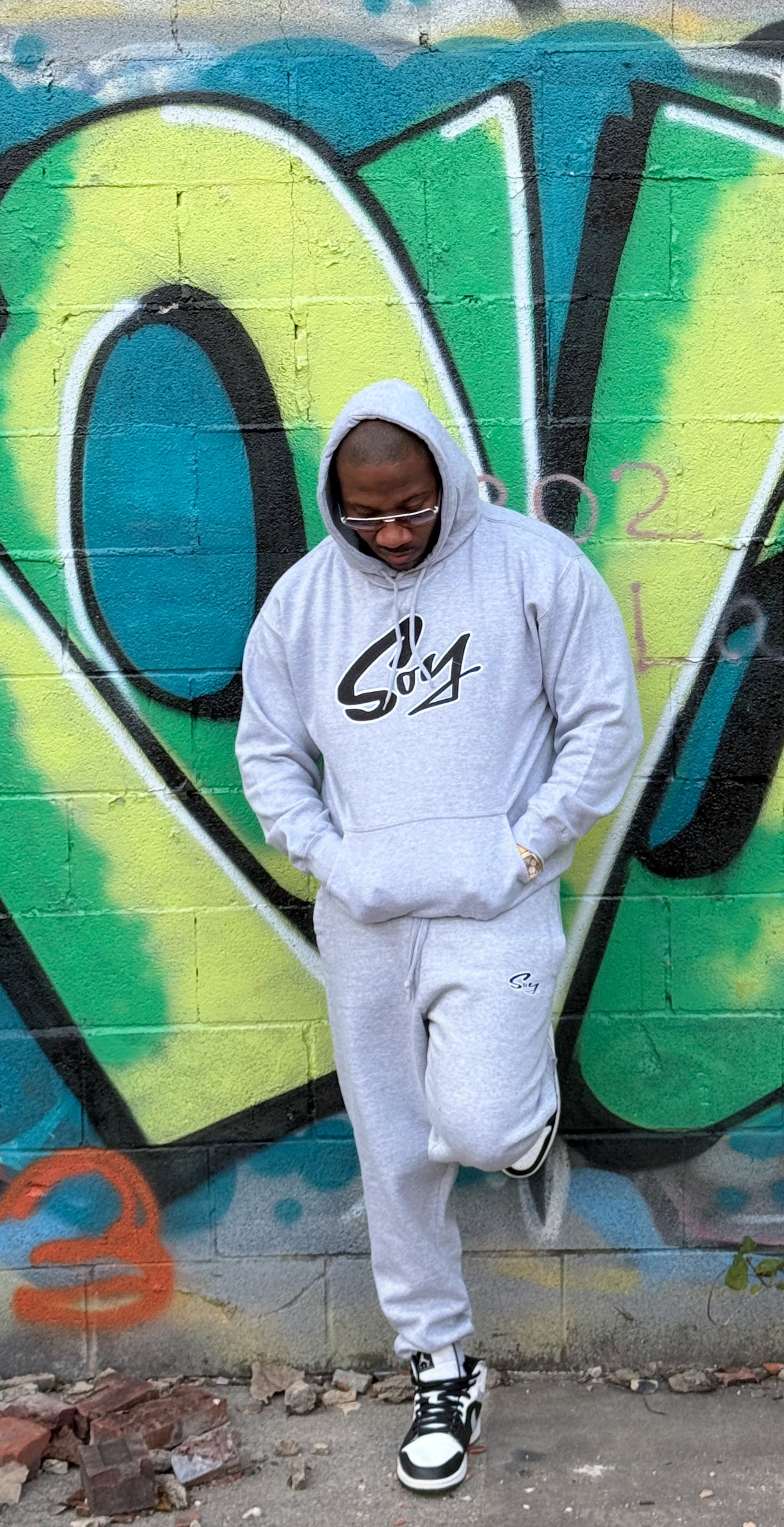 Gray and black with white trim soy hoodie and joggers set